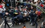تصاویری از نحوه برخورد پلیس با معترضان در دنیا